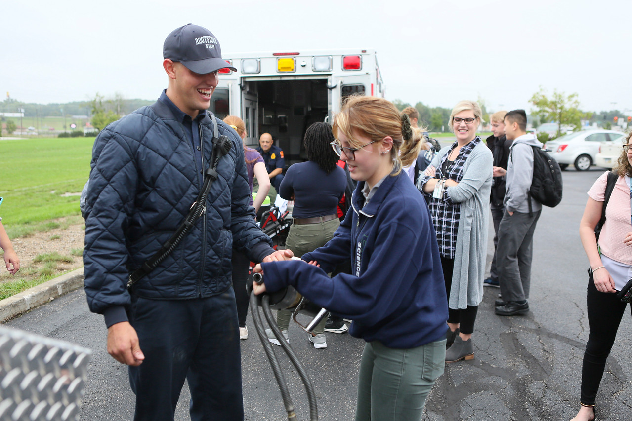 Student with responder at Emergency Responders Career Day