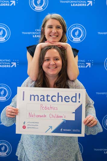 Students celebrate with family and peers on Match Day 2024 at Northeastern Ohio Medical University.