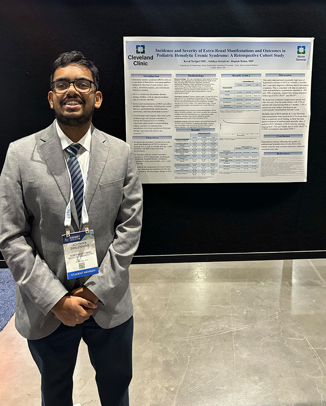 Adithya Sreenivas with his poster at nephrology conference