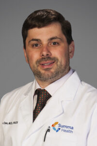 headshot of Dr. Adrian Paul