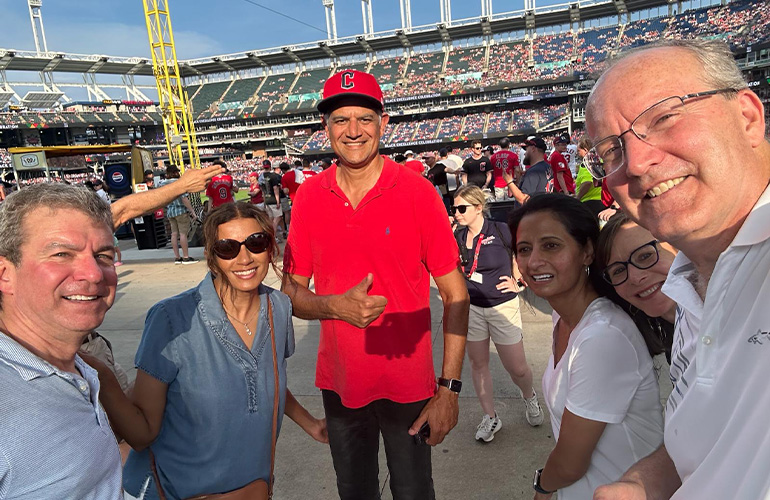 A group of people at a baseball game.
