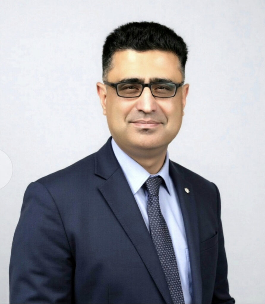 Headshot of Dr Manour Malik