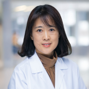 Portrait of Dr. Jun Kim in white coat