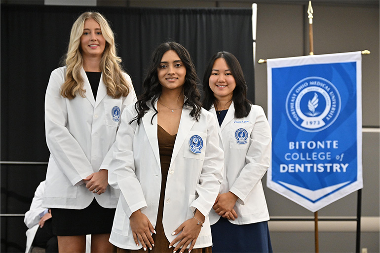 NEOMED Bitonte College of Dentistry students smiling at the 2026 White Coat Ceremony
