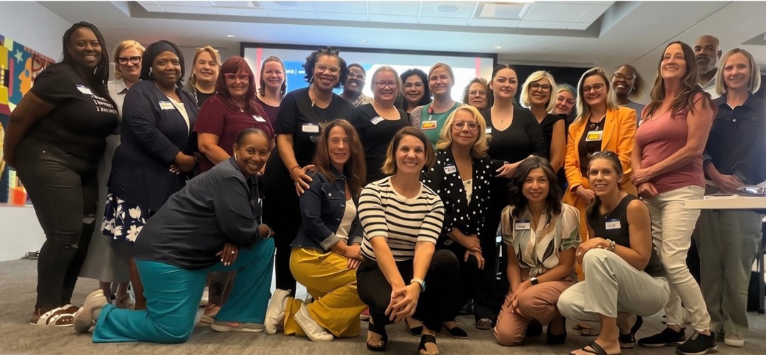 Members of the 2026 cohort of the health and wellbeing coaching program poses in a group photo