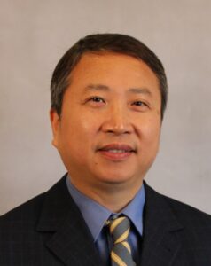 headshot of Xiongwei Zhu in suit and tie