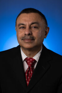 Headshot of Altaf Darvesh